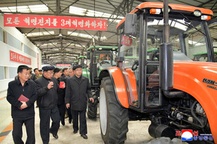 N.K. premier inspects tractor factory