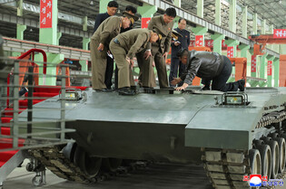 N. Korea's Kim inspects tank factory