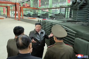 N. Korea's Kim inspects tank factory