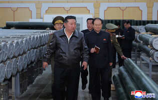 N. Korea's Kim inspects munitions companies