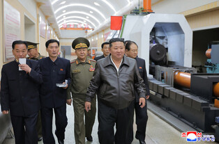 N. Korea's Kim inspects munitions companies
