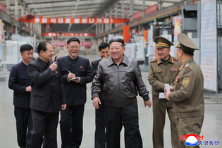 N. Korea's Kim inspects munitions companies
