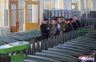 N. Korea's Kim inspects munitions companies