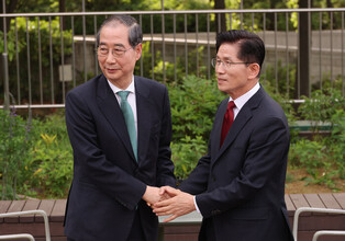 Kim-Han meeting on candidacy unification