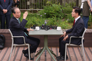 Kim-Han meeting on candidacy unification