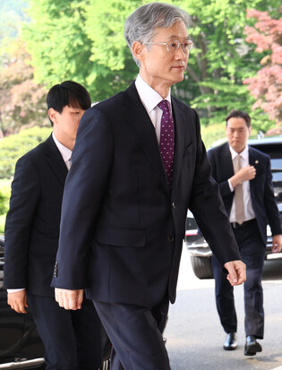 Top court's chief justice declines to appear for hearing