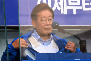 DP candidate shows bulletproof vest