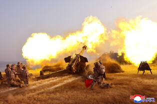N.K. leader watches artillery firing contest