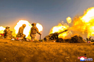 N.K. leader watches artillery firing contest