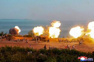 N.K. leader watches artillery firing contest