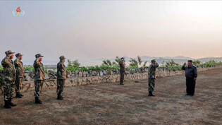 N.K. leader watches artillery firing contest