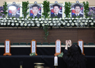 Mourning for victims of Navy patrol plane crash