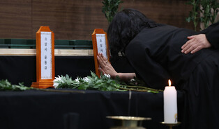 Mourning for victims of Navy patrol plane crash