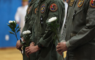 Mourning victims of Navy plane crash