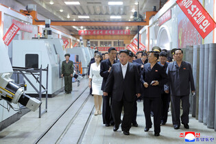 N. Korean leader inspects munitions plant