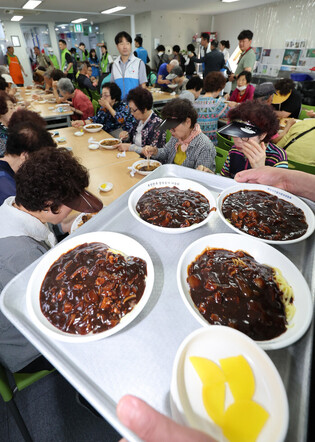 Serving popular noodles to senior citizens