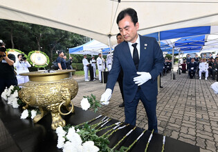 Defense minister nominee pays respects to fallen sailors