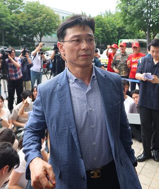 Ex-Marine division commander grilled over Marine death