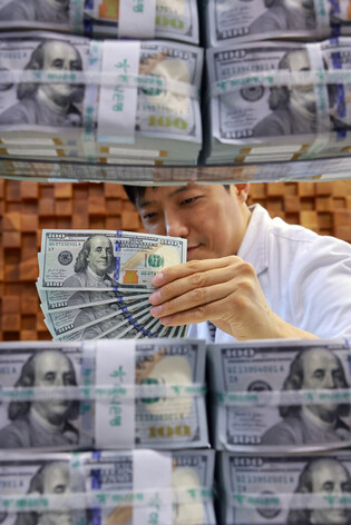 Foreign reserves rise for 1st time in 3 months in June