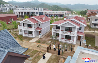 N.K. leader inspects offshore farm under construction