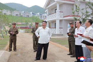 N.K. leader inspects offshore farm under construction