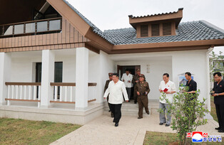 N.K. leader inspects offshore farm under construction