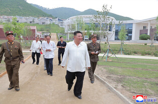 N.K. leader inspects offshore farm under construction