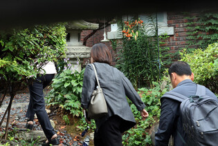 Office of shaman linked to ex-first lady raided
