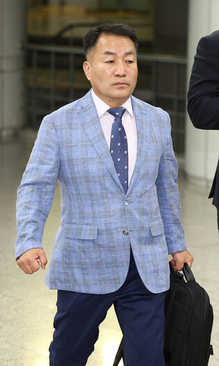 Court to decide on arrest warrant for ex-Marine chief