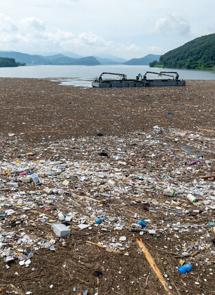 Tap water source covered with trash