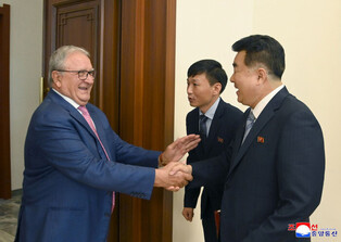 Baseball-softball president visits N. Korea