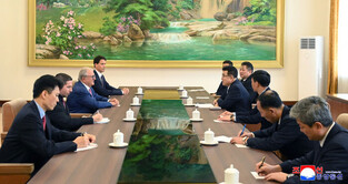 Baseball-softball president visits N. Korea