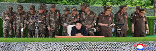 N.K. leader observes firing contest of artillery subunits