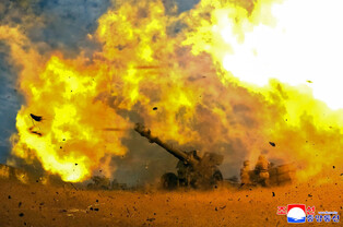 N.K. leader observes firing contest of artillery subunits