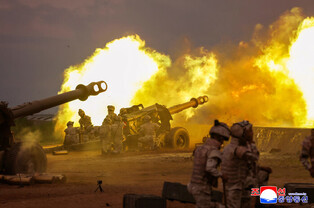 N.K. leader observes firing contest of artillery subunits