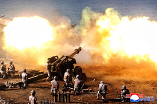 N.K. leader observes firing contest of artillery subunits