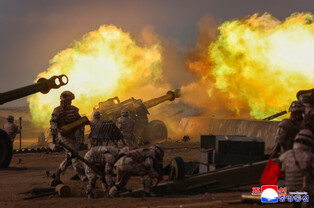 N.K. leader observes firing contest of artillery subunits