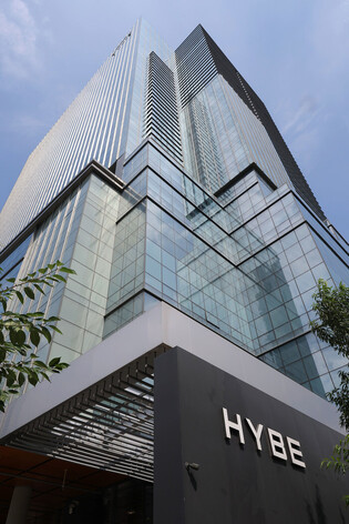Police raid Hybe over founder's alleged unfair trading
