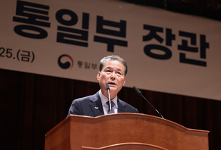 Outgoing unification minister