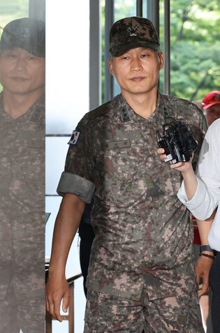 Ex-defense chief's aide grilled over Marine death