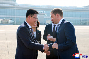 Russian resources minister returns home