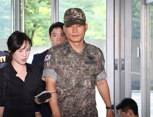 Ex-defense chief's aide grilled for 2nd time over Marine death