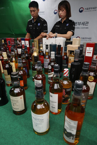 Bottles of smuggled high-end whiskey