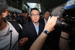 Associate of ex-first lady arrested