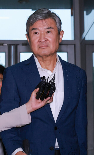 Ex-spy chief grilled over Marine death