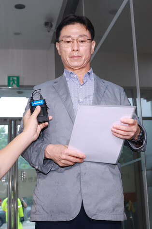 Ex-Marine division commander grilled over Marine death