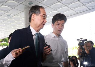 Ex-PM Han grilled over Yoon's insurrection charges