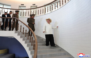 N.K. leader inspects offshore farm, fishing-village district