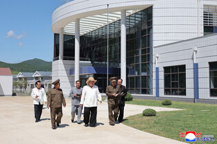 N.K. leader inspects offshore farm, fishing-village district