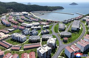N.K. leader inspects offshore farm, fishing-village district